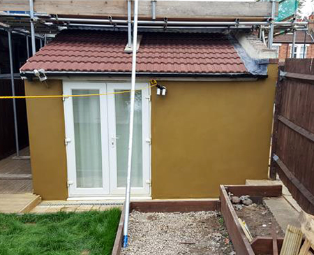 Painted external render on an extension at a house in Croydon
